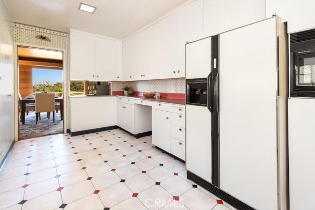 Kitchen opens to Dining Area