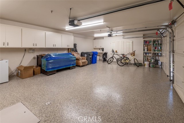 large 3 car garage with new epoxy floor