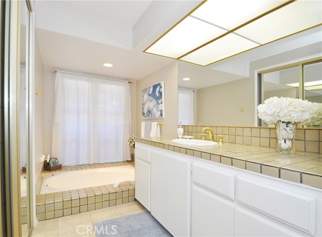 Former Master Bathroom with Tub, Separate Shower and Linen Closet