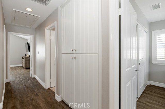 linen storage in upstairs hallway with access to attic linen storage in upstairs hallway with access to attic