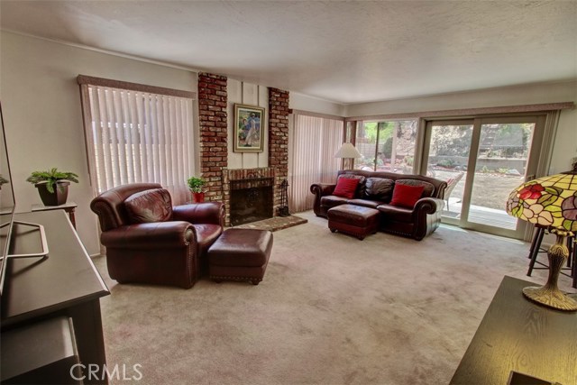 Family room flows out to the ample backyard for family gatherings and great entertaining