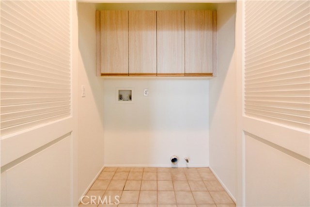 The laundry closet is upstairs