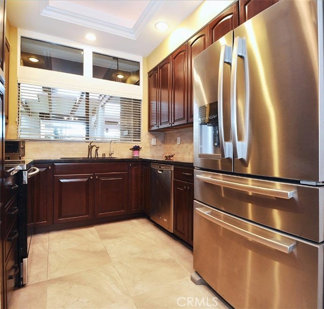 There is a lovely open view of the common area courtyard from this kitchen window.