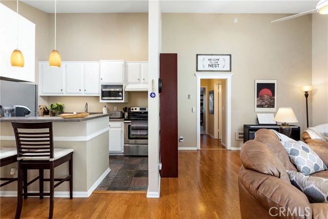 Kitchen adjacent to living room. Great for entertaining.