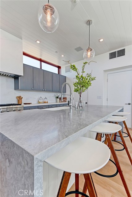 Center island with Bleu de Savoie countertop