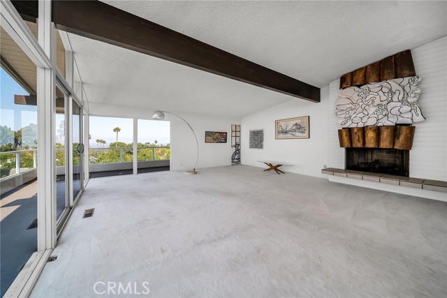 Living room includes a fireplace