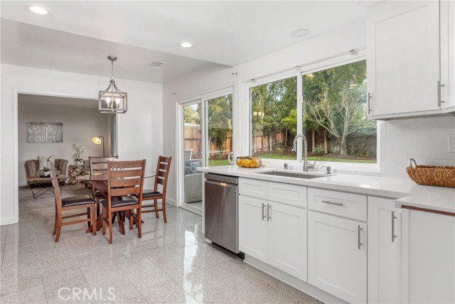 Kitchen & Family Room Open to Spacious Rear Yard