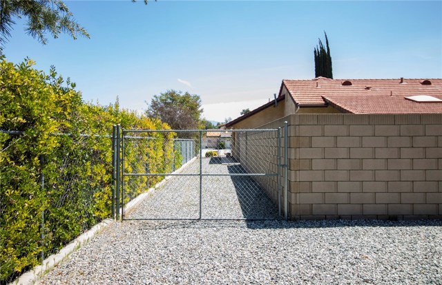 Gated access to cross fenced back yard