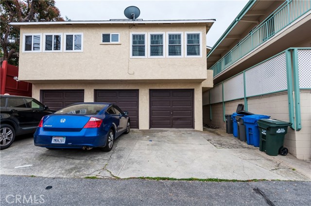 Currently, each unit has the use of one garage space + one car parking on apron.