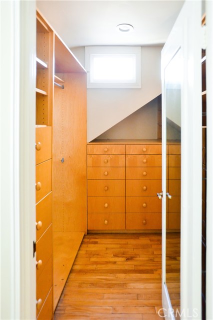 Walk in closet in master bedroom.