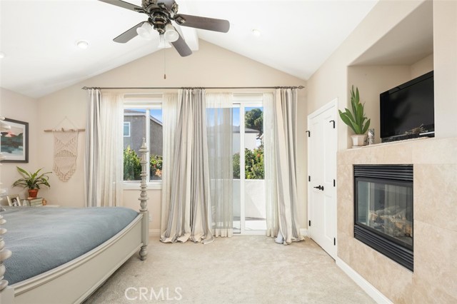 Fireplace and walk-in closet create a special retreat.