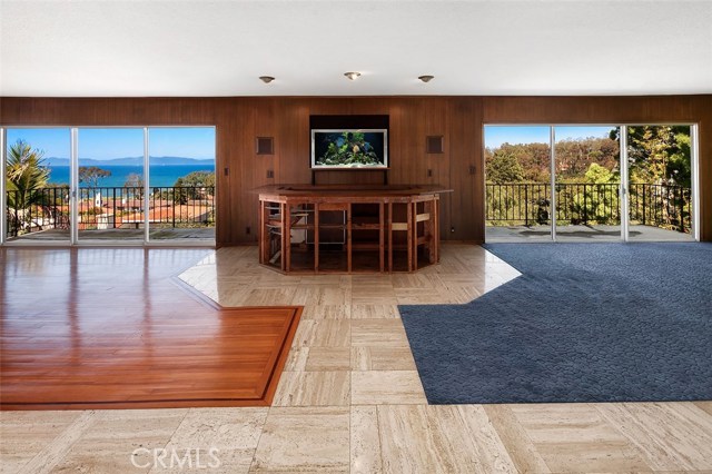 Fantastic Malibu/Ocean Views from the main floor great room.  Unfinished bar in the center of the room with a fish tank.