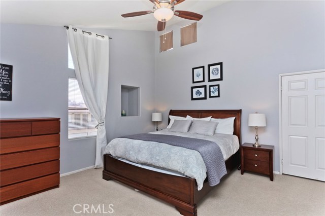 Bright and spacious master bedroom with walk in closet and attached bathroom.