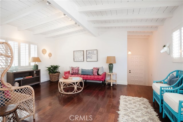 Entry flows to spacious living room.