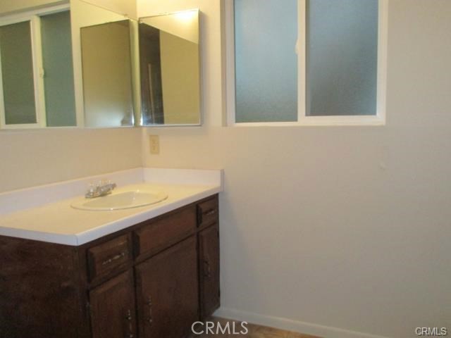 Main Hall Bath with natural light from the window.