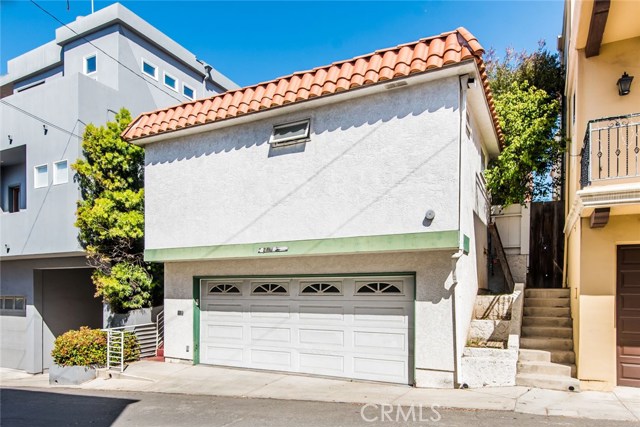 Two car garage with guest unit above garage.