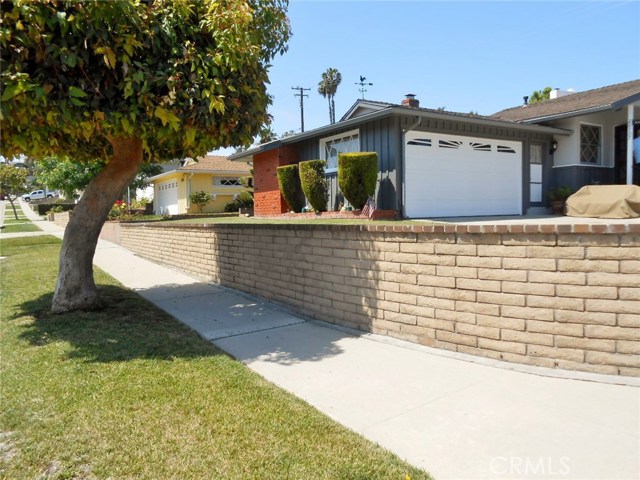 View of Home to show its Elevation from Street and Sidewalk down the Neighborhood.