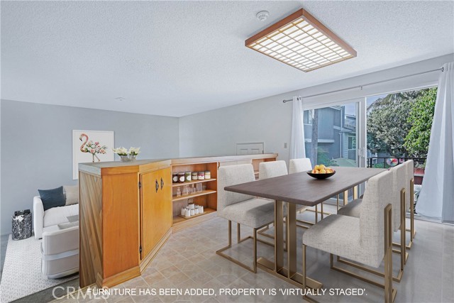 Dining Area off Kitchen, Virtually Staged, furniture 'added'.
