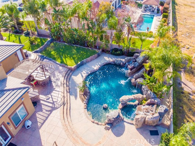 Pool featuring Spa, Waterfalls and Slide.