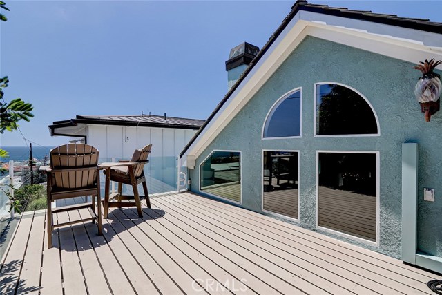 top level patio perfect for enjoying ocean views and entertaining with family/friends
