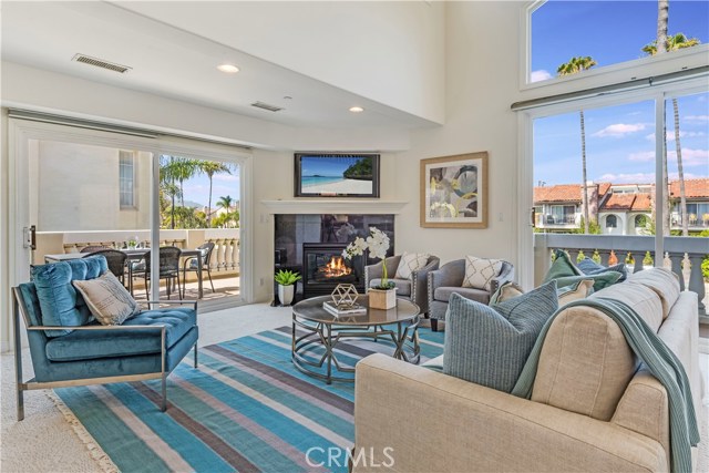 South and West Facing Living room with lots of natural light.  Opens up to two separate balconies