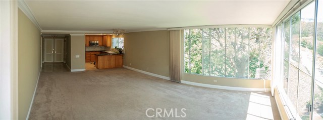 Living Room looking in to Kitchen and Entry Way