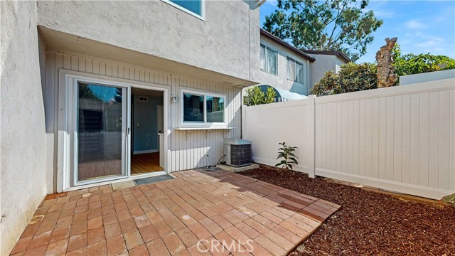 Private patio that leads to the garage
