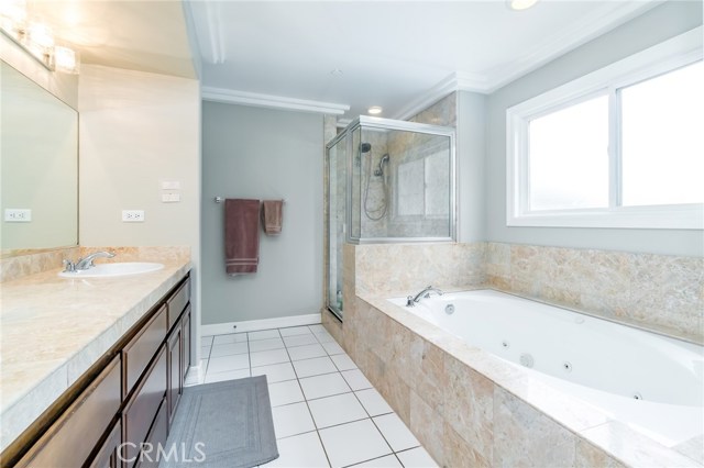 Master Bath with double sinks, jetted tub and separate shower.