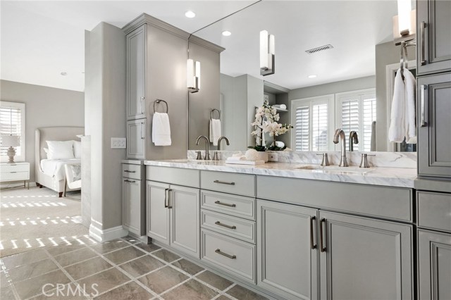 Primary Bathroom with Goregous Cabinetry, Stone Counters, Steam Shower, Spa Tub