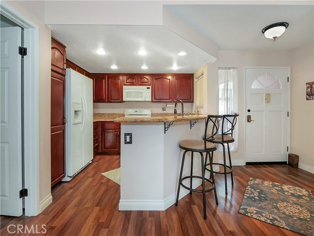 Kitchen with window opens to living areas.