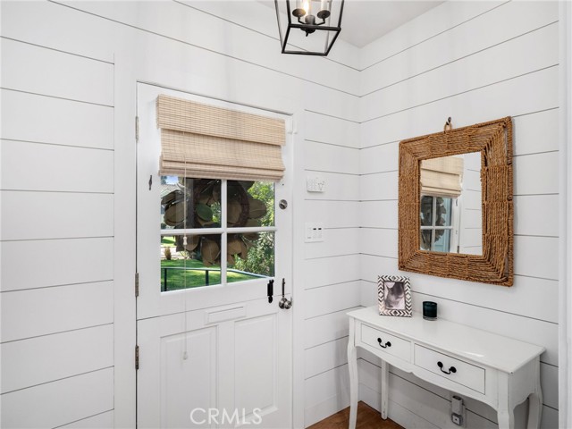 Entry foyer with shiplap walls