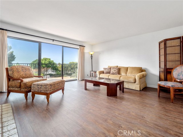 Living room with new flooring (and less furniture)