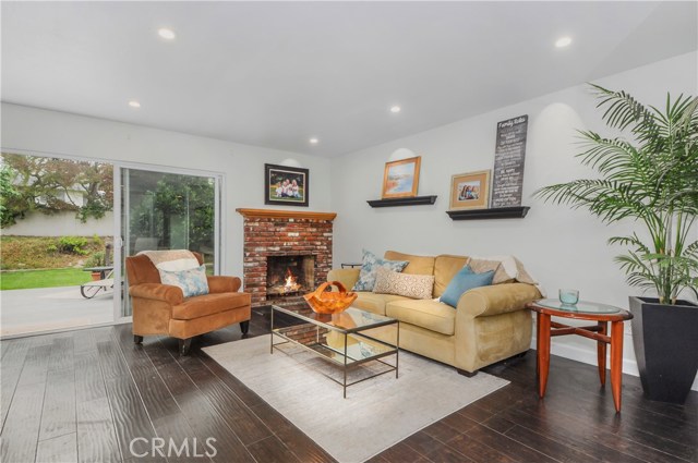Fireplace in family room enables cozy atmosphere. Fireplace in family room enables cozy atmosphere.