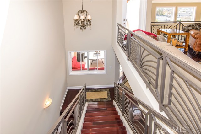 Staircase showing the gorgeous wrought iron railings!