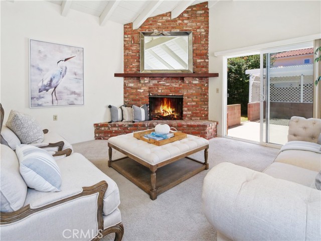 Opens to the backyard and patio.