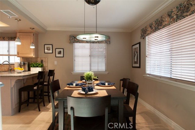 Dining Area with view of breakfast bar.