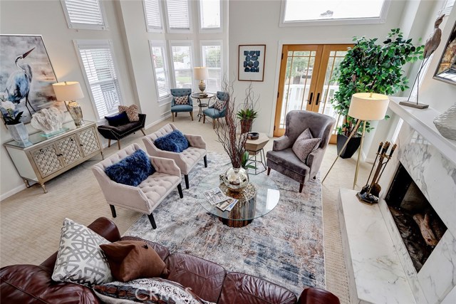 Custom window treatments are found throughout the living room.