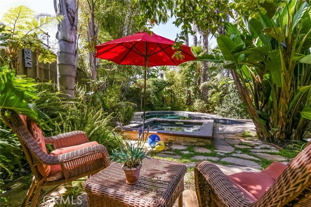 View of Jacuzzi with Pool in the Background