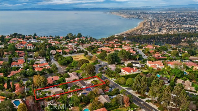 Aerial View with Lot and Home Highlighted in Red