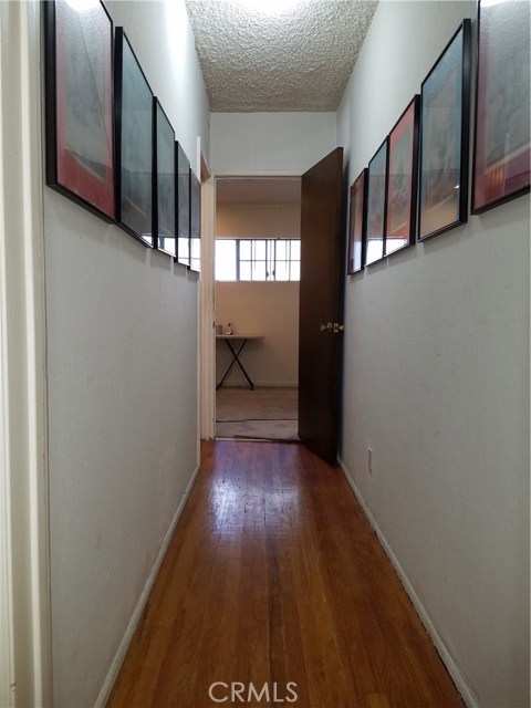 Hardwood Floor in Hall way and two out of three Bedrooms
