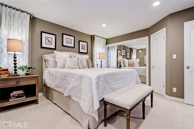 Entry Level Main Floor Master Suite Area with Mirrored Wardrobe Closet