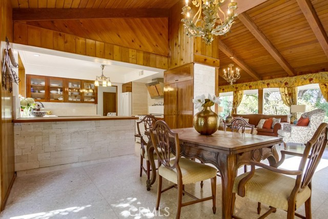 Dining area overlooking room and front yards