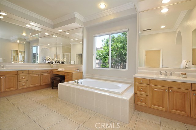 Large Master Bathroom with Tub and Double Vanity Area