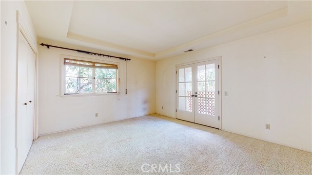 Upstairs bedroom facing backyard