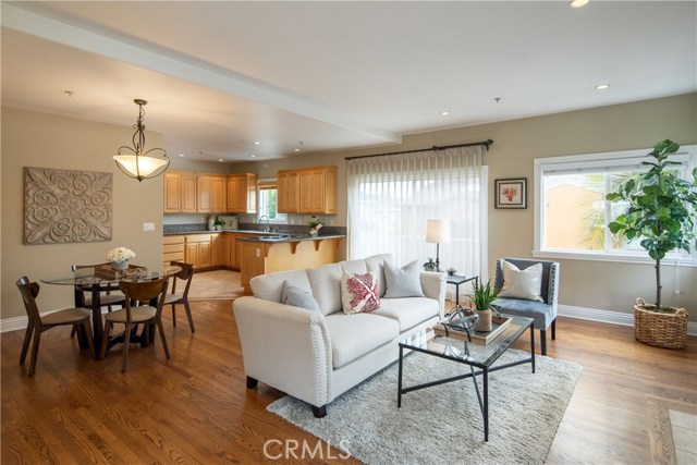 The open great room style living space is light filled with a functional and comfortable layout.