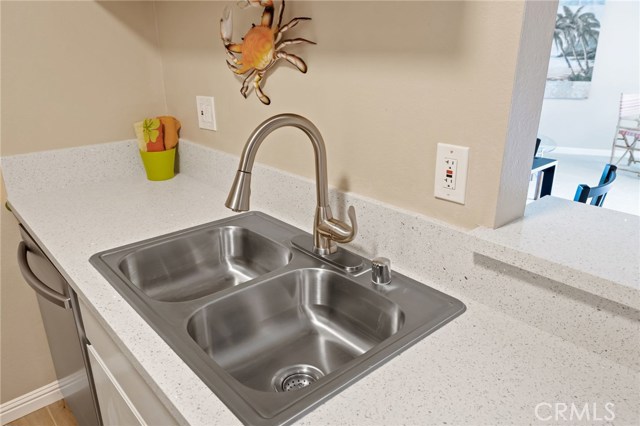 Newly installed gorgeous Quartz counter-tops and breakfast bar