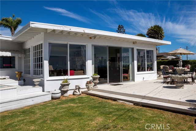 The glass room and large deck.