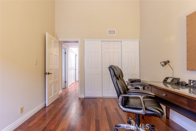 Bedroom (see closets in the background). 
 Currently used as kids study area