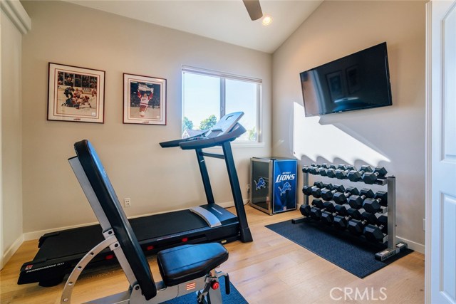 One of four bedrooms, currently used as a gym.