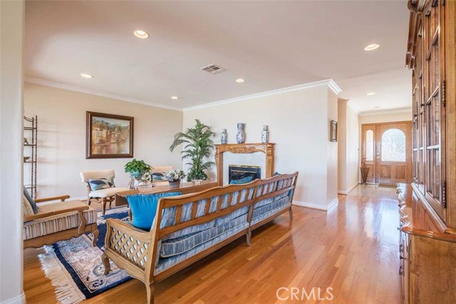 Glistening Hardwood Floors, Spacious Living Room with Gas Fireplace